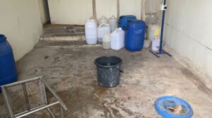 Chemical drums outside the facility.