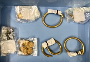 Gold and silver items found in Srisailam before the plates