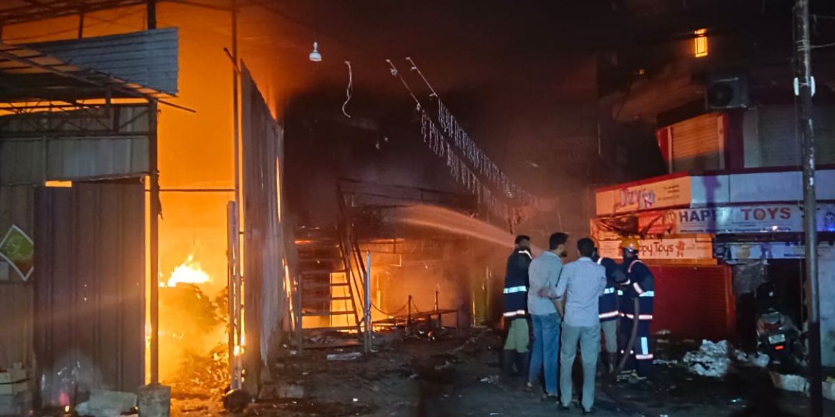 Emergency personnel at the site of the fire in Ernakulam.