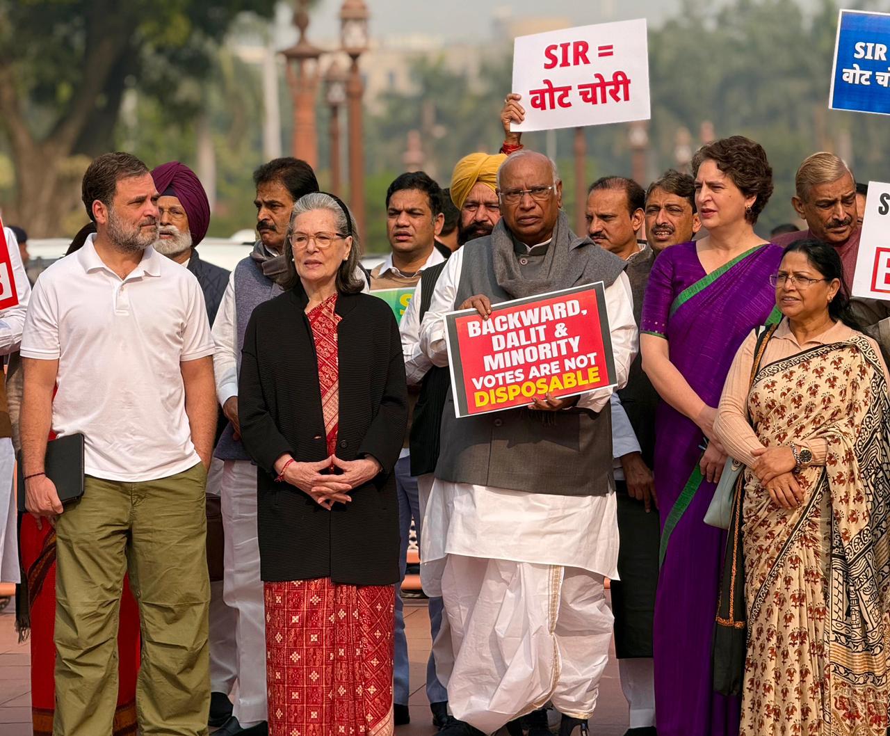 Opposition leaders protest. demanding a debate on SIR.