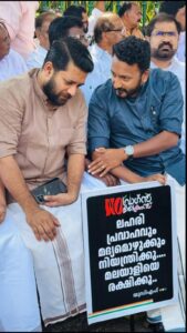 Rahul Mamkootathil (right) and Shafi Parambil.