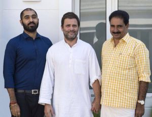 Karthik Premachandran (L) and NK Premachandran with Rahul Gandhi. (Facebook/KarthikPremachandran).