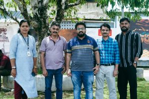 Sajna and Sharon (center) with the experts visiting the Muziris Heritage site.
