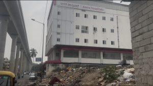 Garbage dump next to a hospital on Bannerghatta road