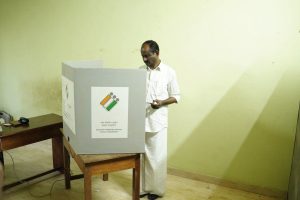 Karayi Rajan, the LDF candidate in the Thalassery Assembly constituency, cast his vote at Booth No. 32 in Pullyod Government LP School, Kannur