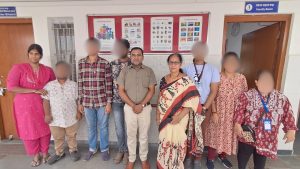 Parents along with their children wearing the Suraksha Kavach pendants 