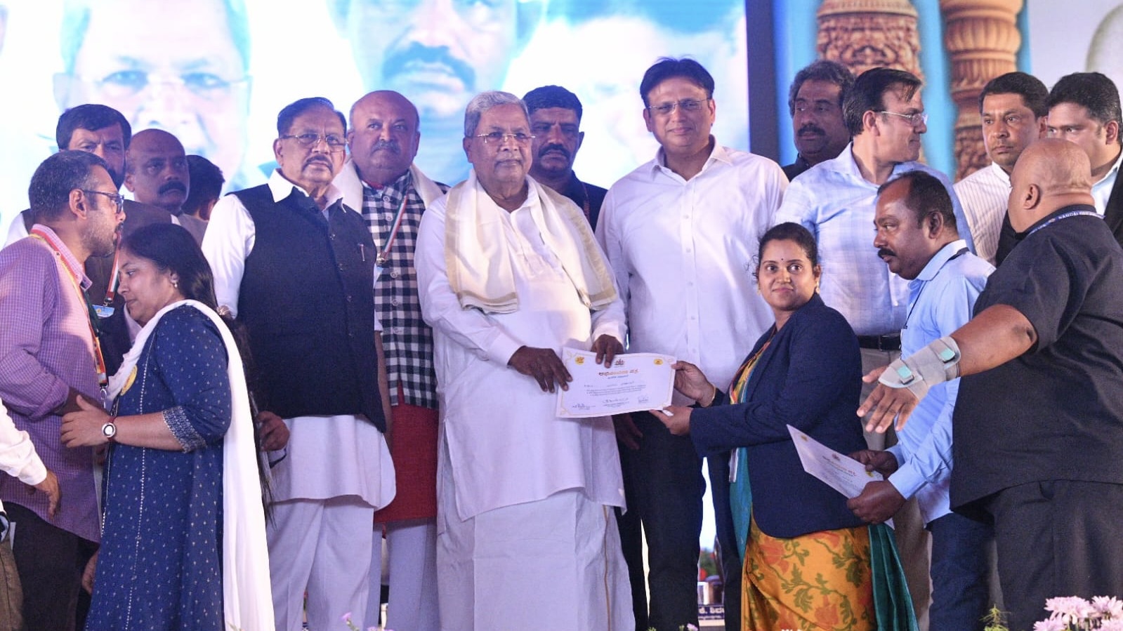 Karnataka Congress govt marks three years with record Bhoo Guarantee deed drive