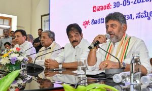DK Shivakumar (right) with Randeep Singh Surjewala (L-R), Siddaramaiah and KC Venugopal at the CLP meeting.