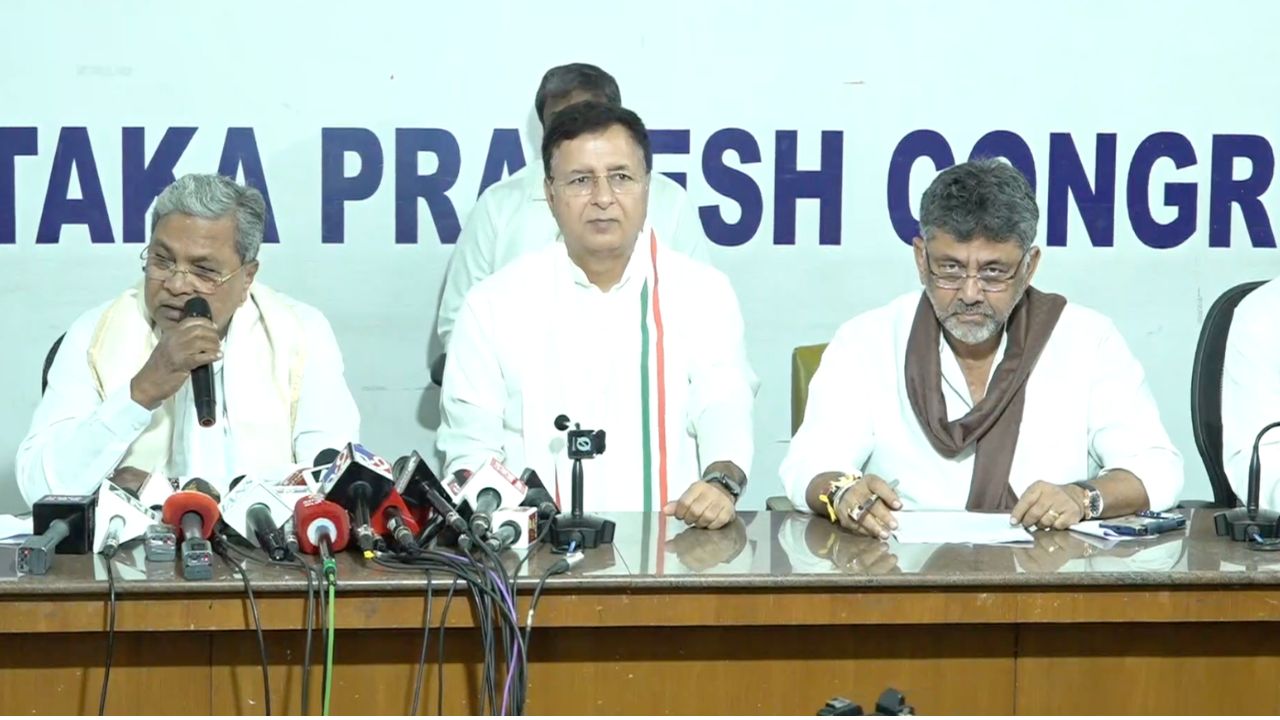 Congress leaders, Siddaramaiah, Randeep Singh Surjewala, and DK Shivakumar, during the press conference.