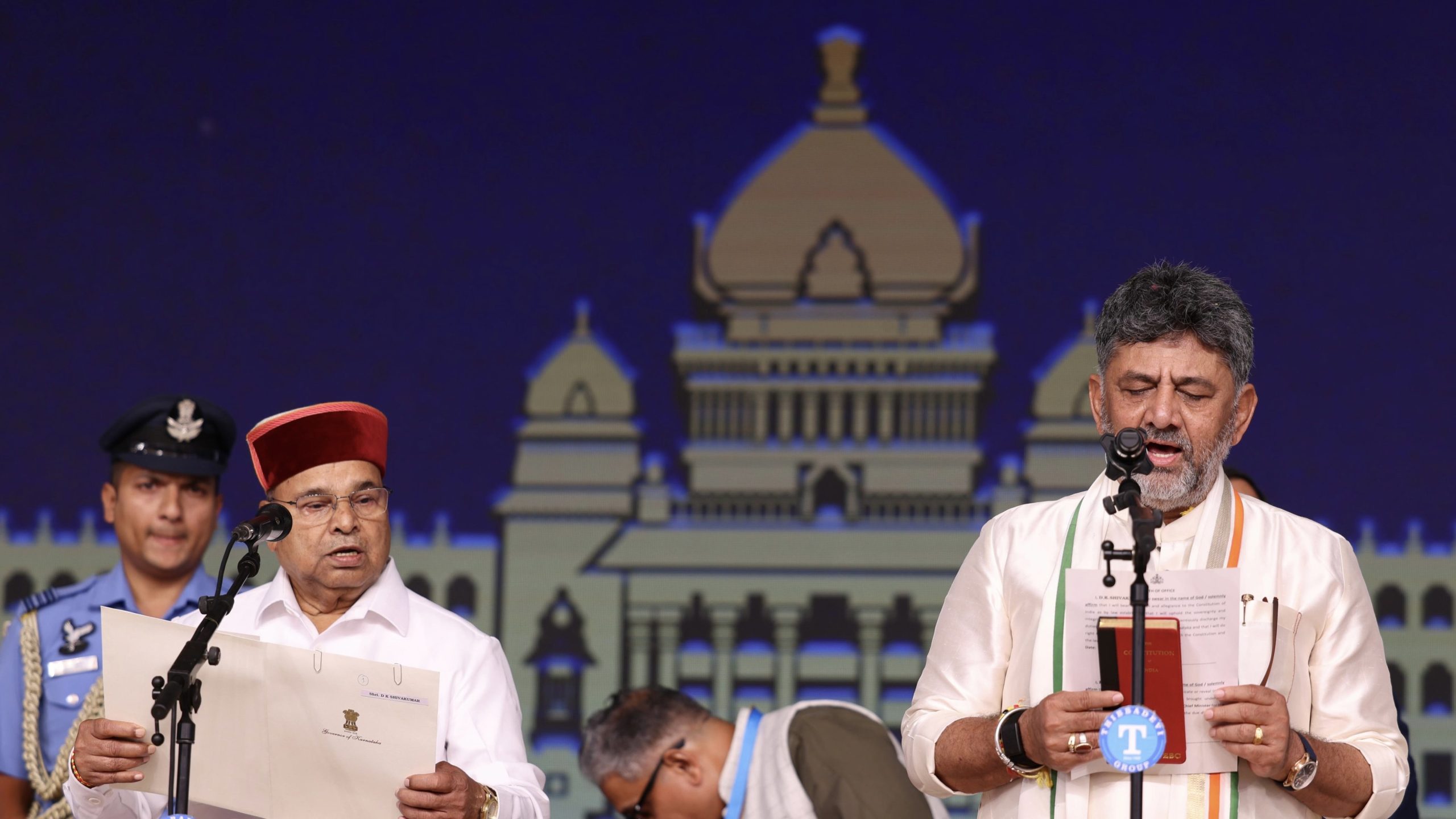 DK Shivakumar is administered the oath of office by the Governor.