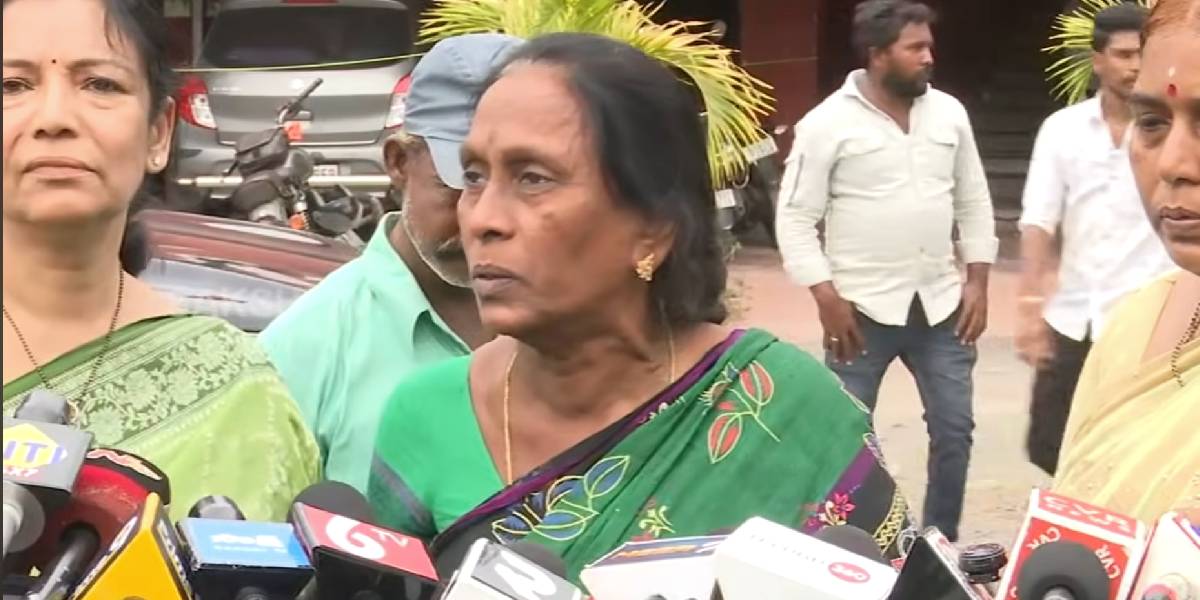 Gade Vijayalakshmi speaking to the press outside the sub-collector's office in Vijayawada.