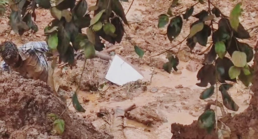 A person trapped in mud.