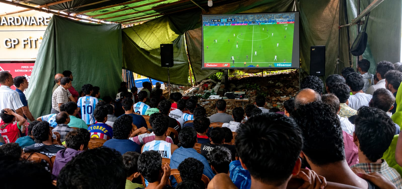 ‘At home I am alone, not here…’: The joy of watching the football World Cup on community screens