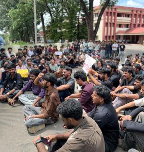 Students protesting on the MACE campus.