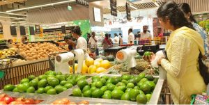 People purchasing Indian avocados at Lulu Mall in Kottayam.