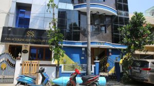 ICWO office in West Anna Nagar, Chennai, with CCTV cameras visible on neighbouring residential buildings.