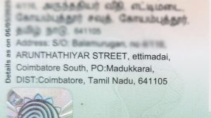 An Aadhaar card displaying “Arunthathiyar Street” in the residential address field