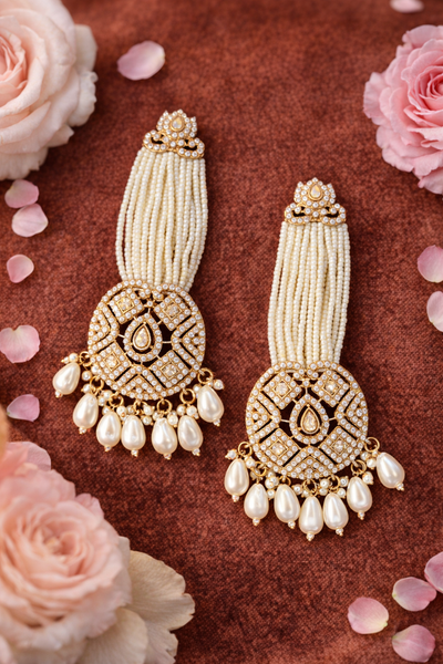 Elegant Pearl and Stone Tassel Jhumkas - Jhumkas | Savyra