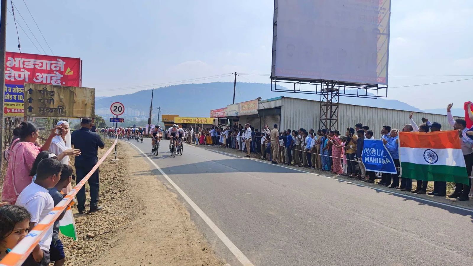 MUWCI students cheer cyclists at Pune Grand Tour