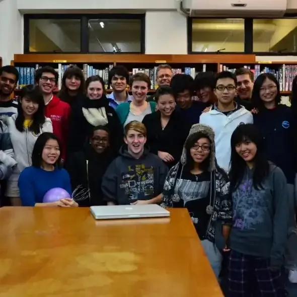 A large group of students gathered in the campus library