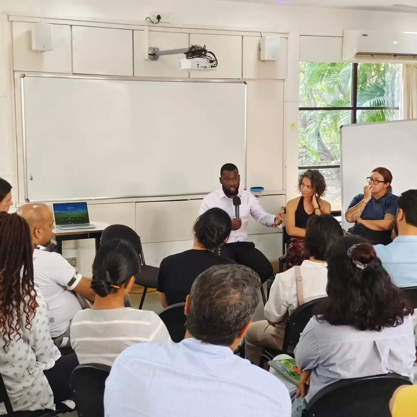 A MUWCI classroom discussion with students and faculty