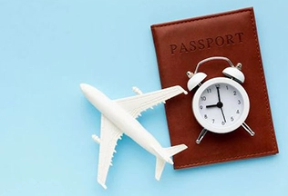 Symbols of Visa Services: Passport, Small Watch, and small  Air-plane model