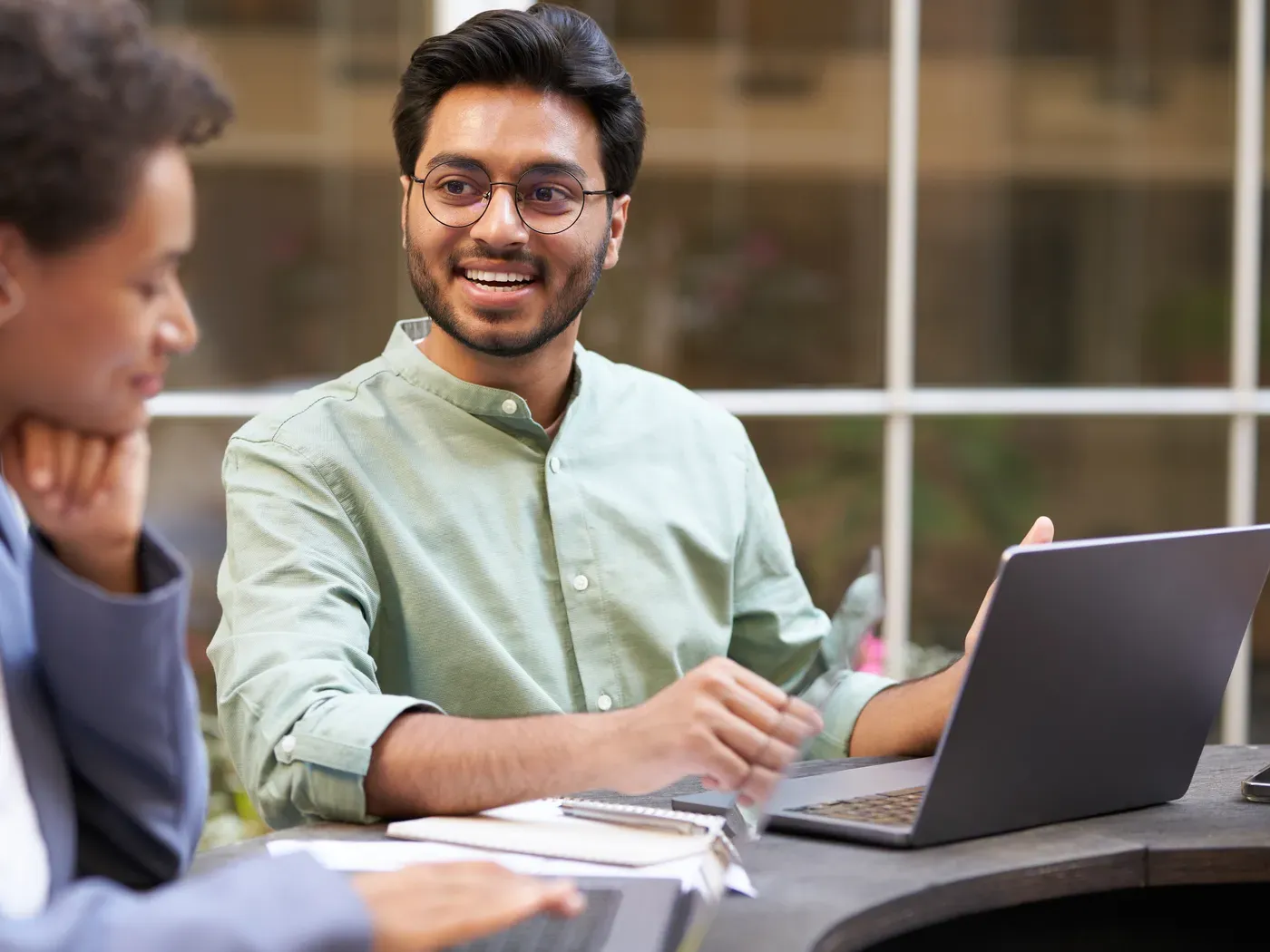 Team working together on an office terrace