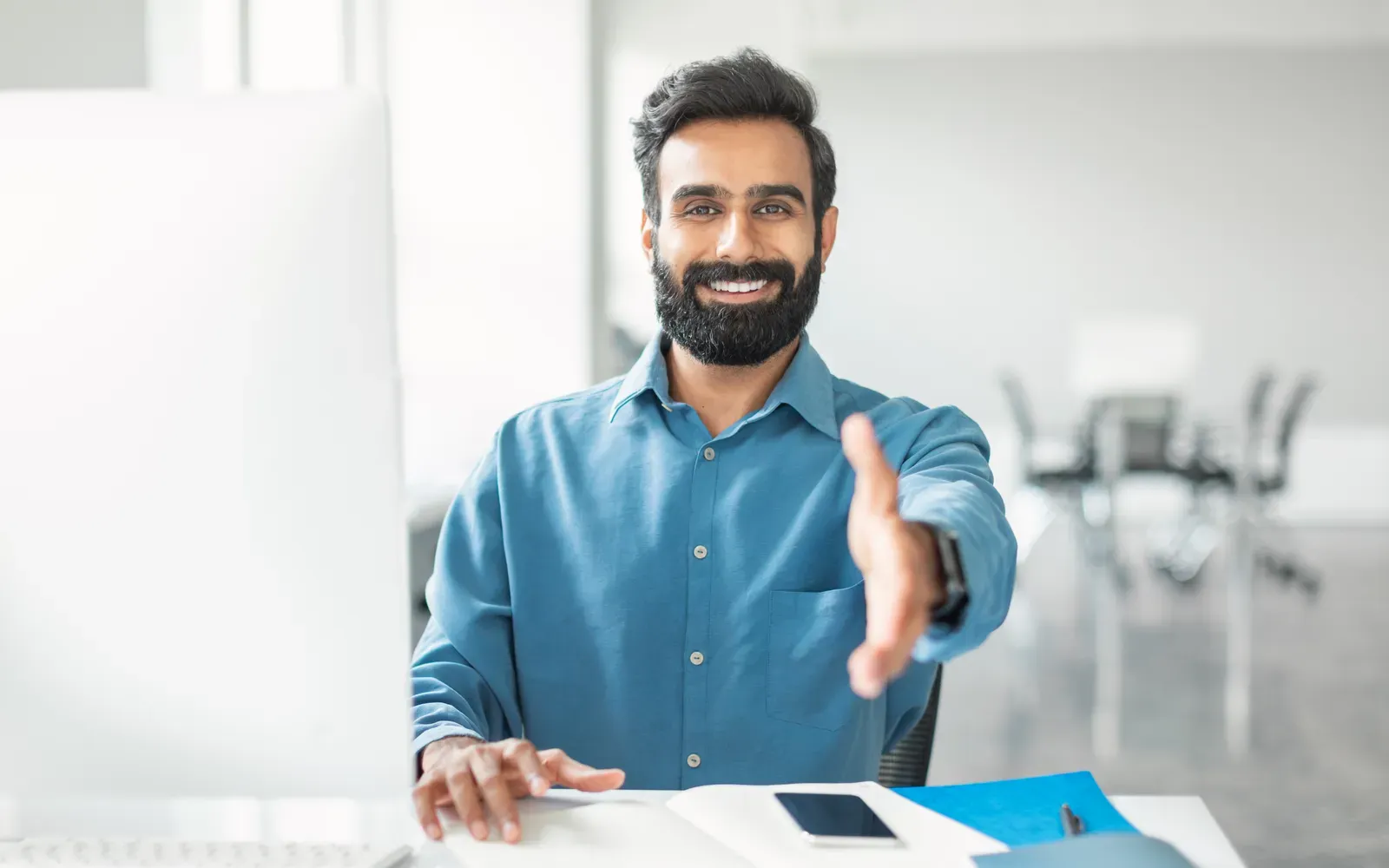 Welcoming a new team member with a handshake