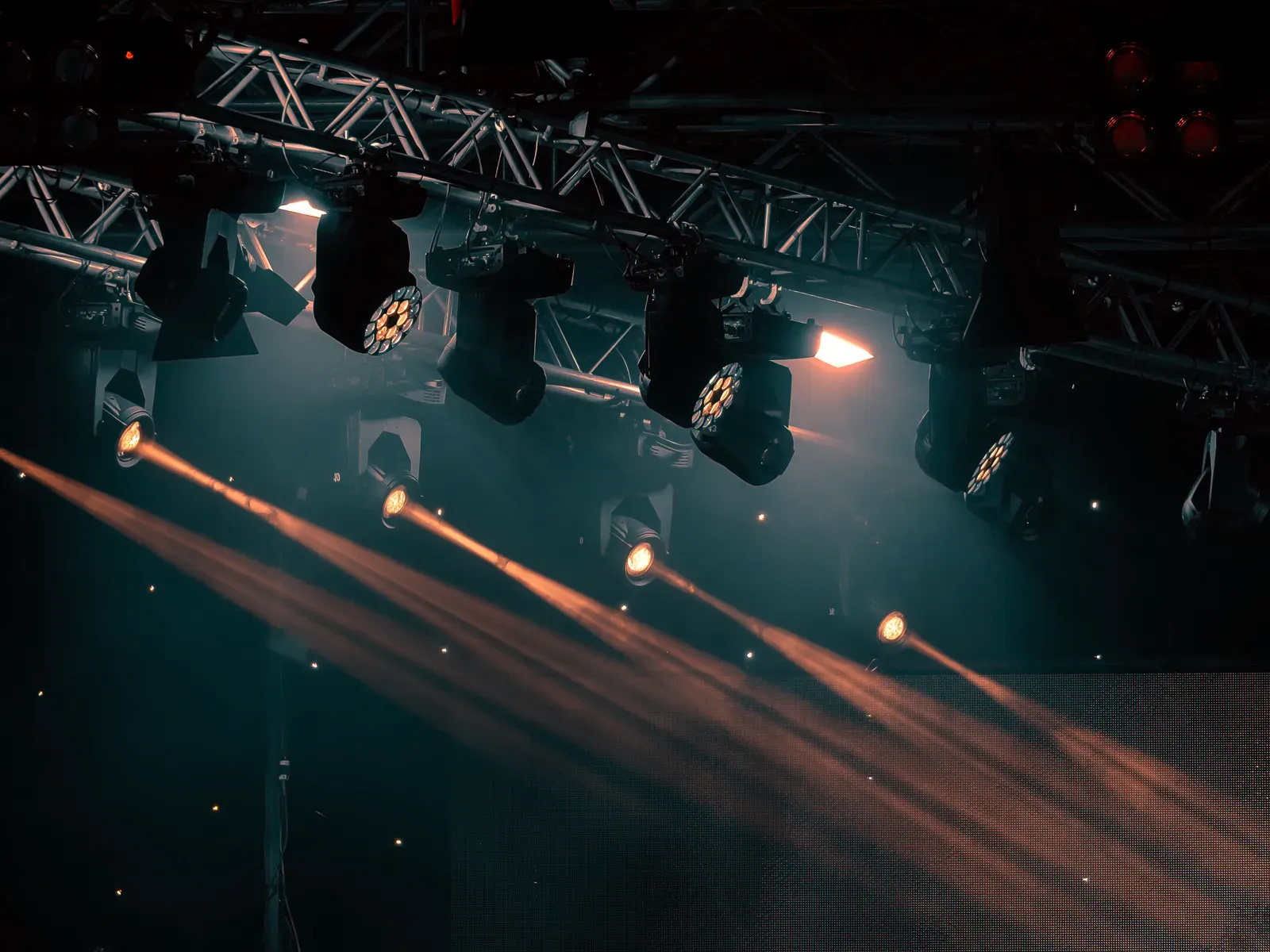 Concert lighting, luminous rays on dark