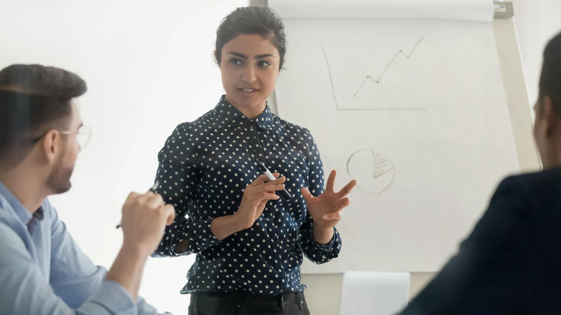Indian trainer leading a corporate workshop