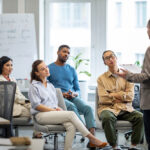 What is the ABCD model of coaching?