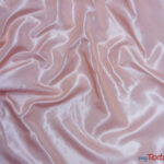 How Can Taffeta Fabric Be Used for Stage Design and Backdrop Installations?