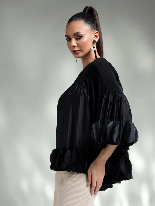 Stylish Ways to Pair Tops with Pleated Skirts