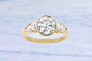 How Do Different Diamond Cuts Influence Custom Jewelry Designs?