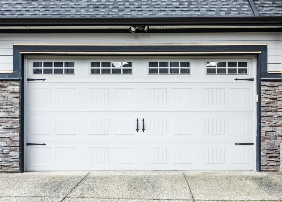 What are the warning signs that you need garage door spring repair right away?