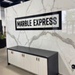 Beyond the Open Floor Plan: Why Lobbies and Wall Murals Shape the Future of the Dallas Office