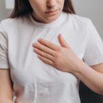 What are the most common symptoms of heartburn?