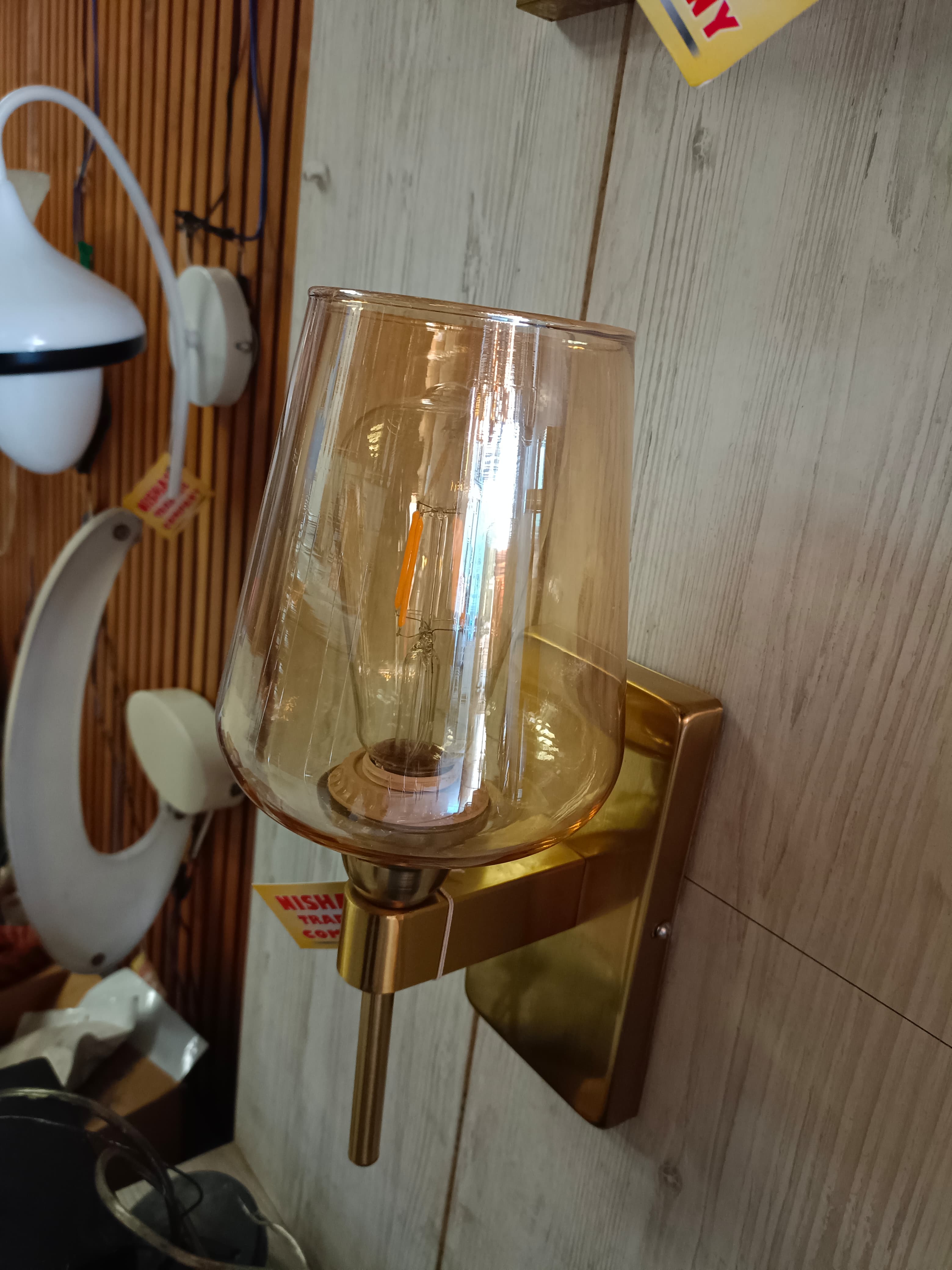 Illuminate Your Space: The Story Behind the White Lotus Glass Wall Lamp