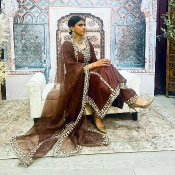Embrace Elegance with the Brown Aari Suit: A Tale of Tradition and Transformation