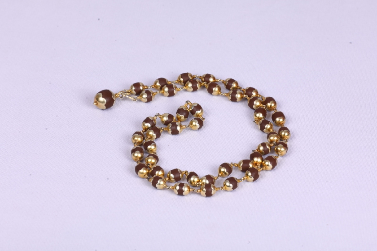 Embracing Spirituality with Elegance: The Story of Mala Gold Plated 55 Beads