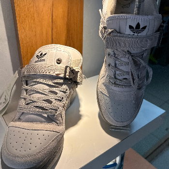 Stepping Up Your Game: How Sneaker Hub's Bad Money Sneakers Transform Lives