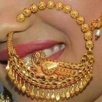 Embracing Heritage with Elegance: The Gold Nath That Completes Every Indian Bride