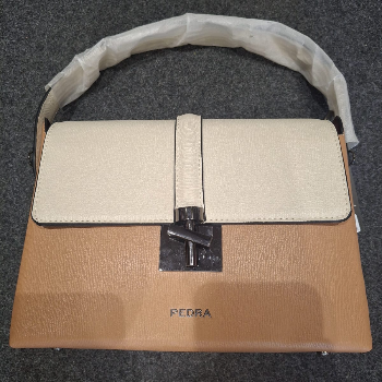 Embrace Elegance and Functionality with the Pedra Leather Bag