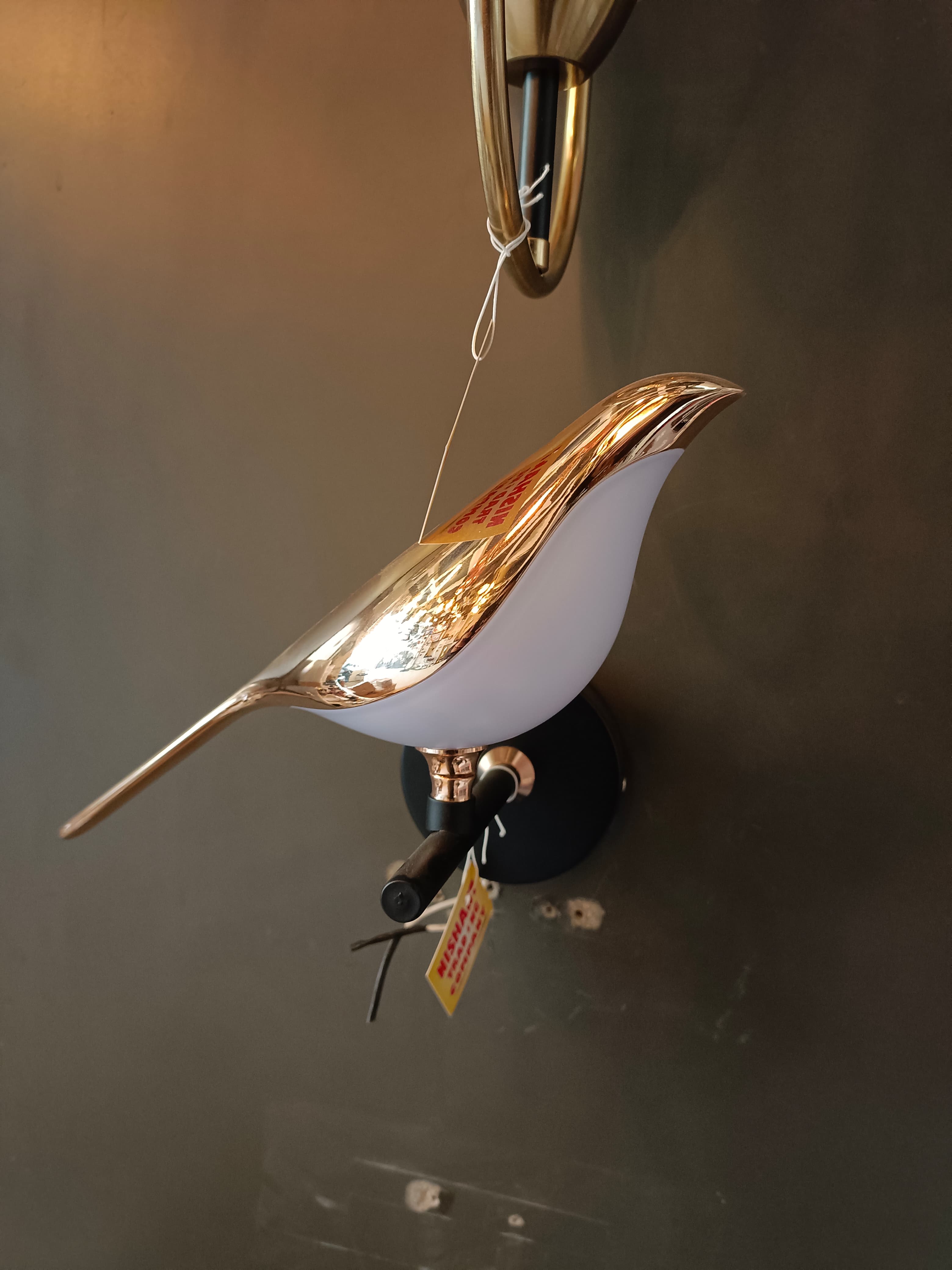 Illuminating Homes with Elegance: The Bird Shape Wall Lamp Story