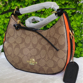 Elevate Your Style: How Coach Signature Coated Canvas Transforms Your Everyday Experience | K K APEX GLOBAL