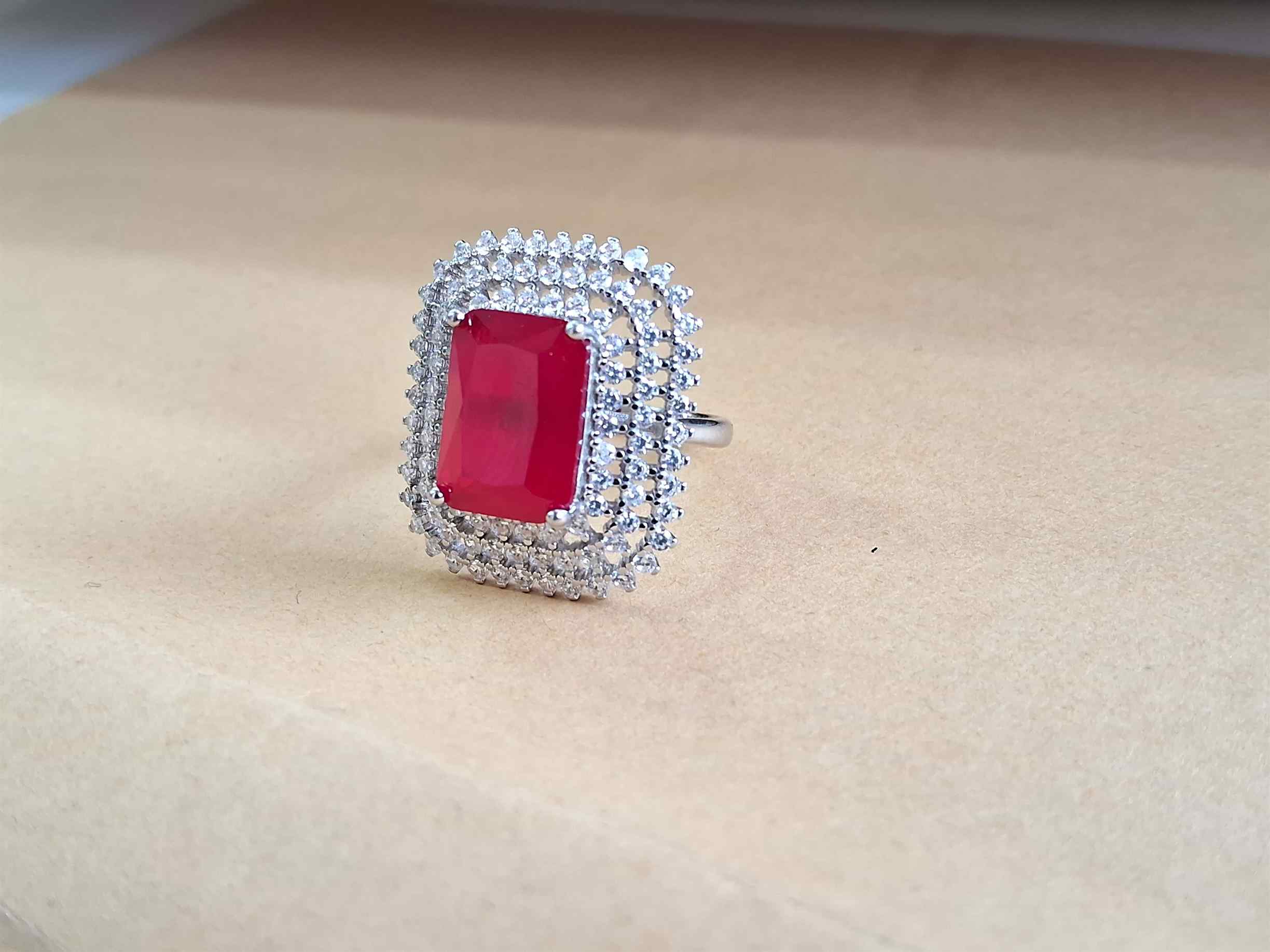 Embrace Elegance: How the Silver Cocktail Ring with Red Stone Transforms Lives | PAVAN JEWELLERS