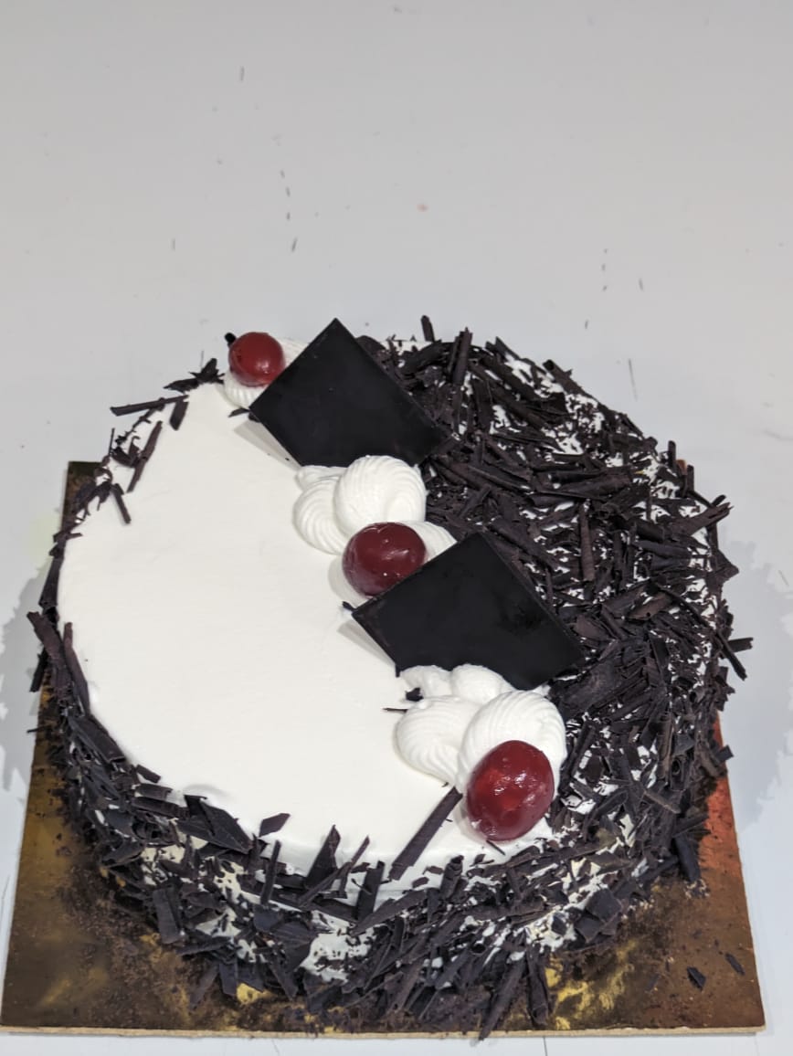 Unveiling the Sweet Symphony: How Black Forest Cake Solves the Modern Dilemma | LOVE BITES CAKES N CAFE