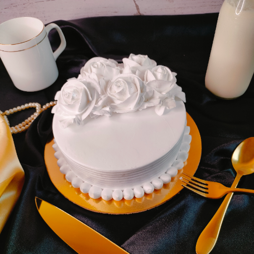 A Slice of Happiness: How the White Crystal Rose Cake Transforms Celebrations | PRIGO