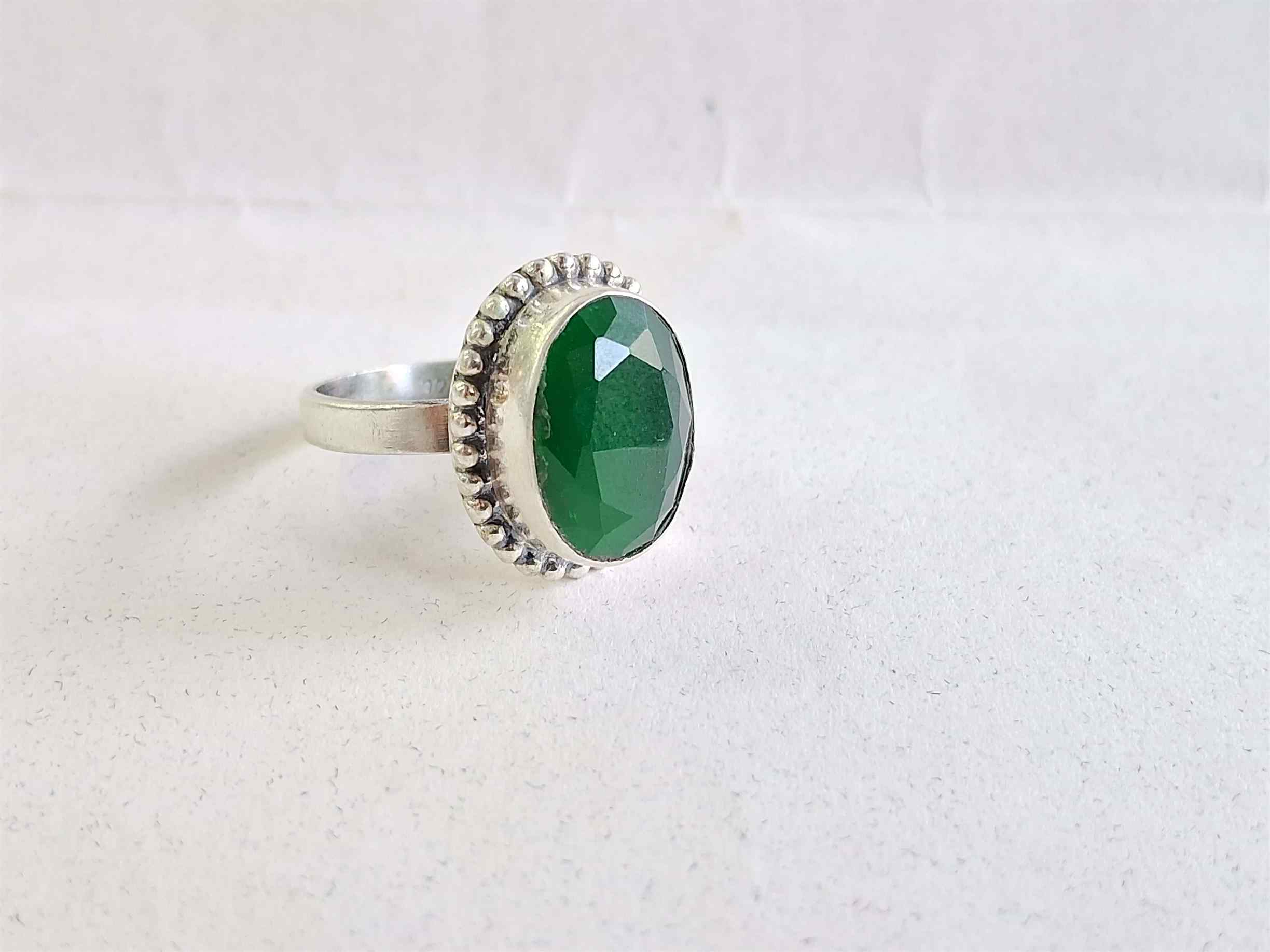 Embrace Elegance and Resolve Emotional Turmoil with Our Silver Ring with Green Stone