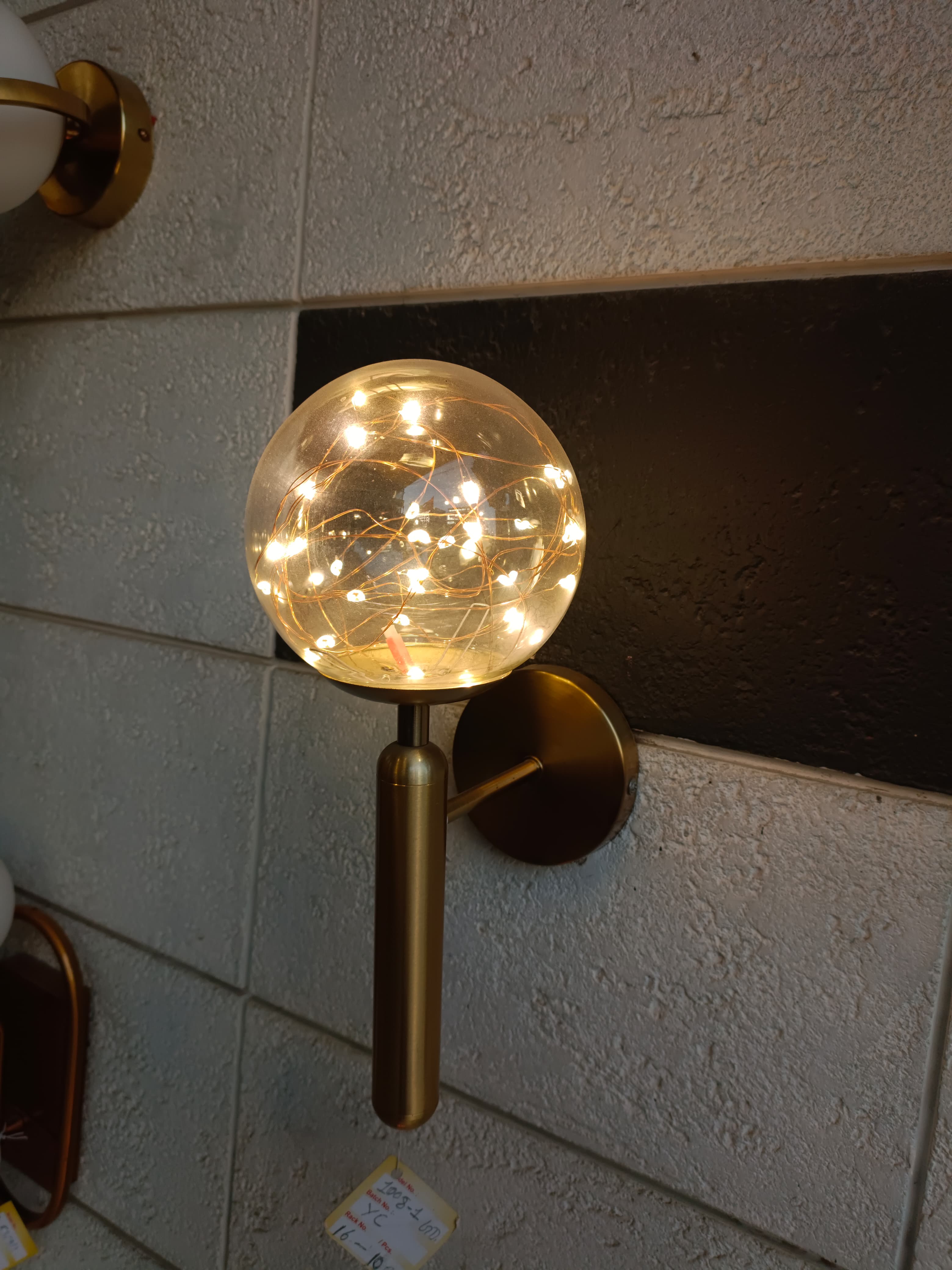 Illuminating Elegance: Transform Your Space with the Fairy Glass Ball Wall Light